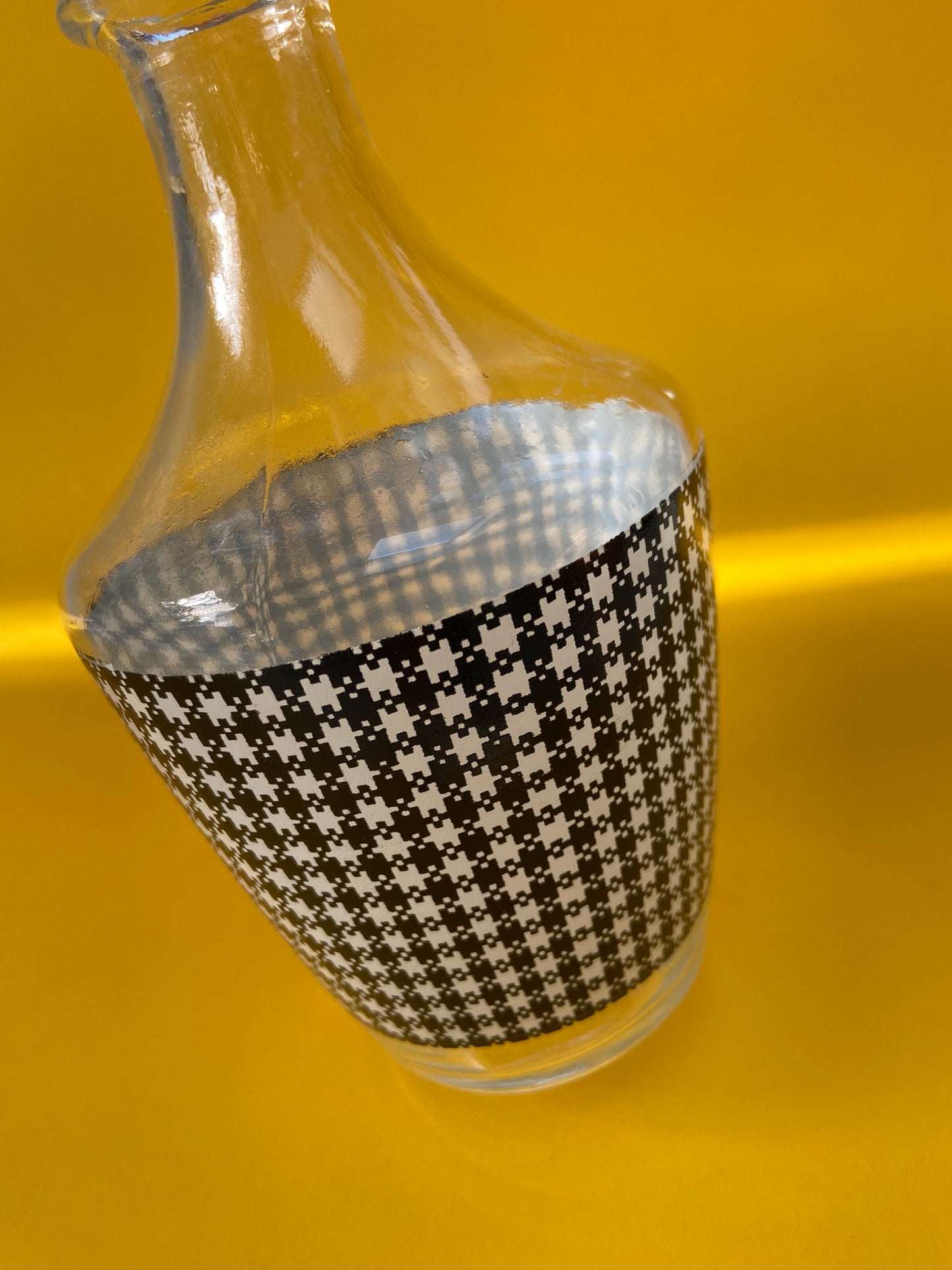 Small vintage carafe with houndstooth pattern