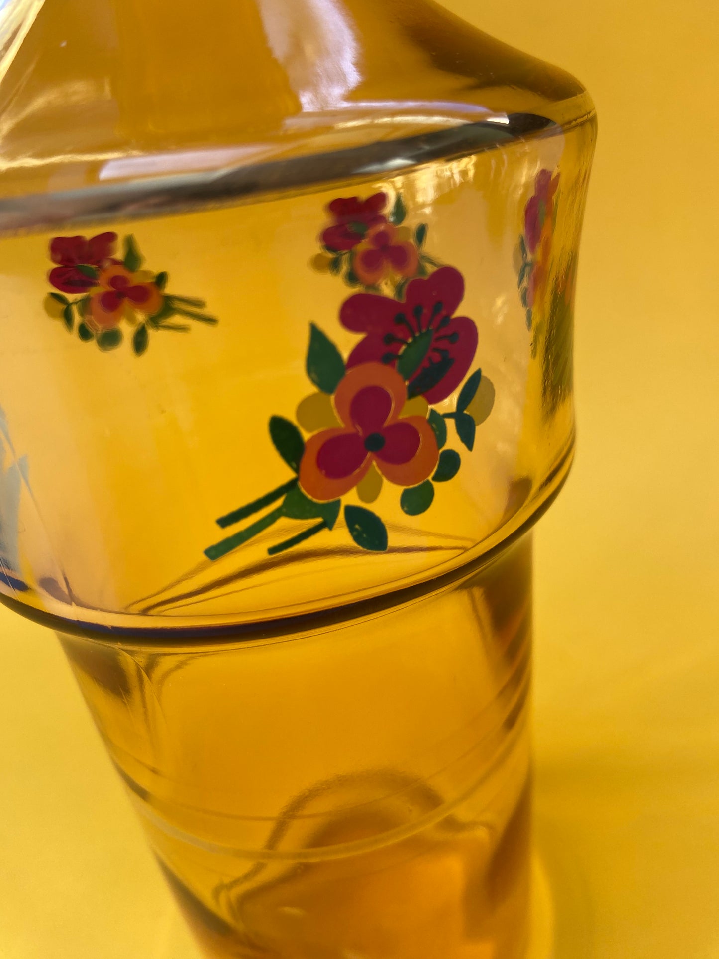 Vintage amber carafe with flower pattern