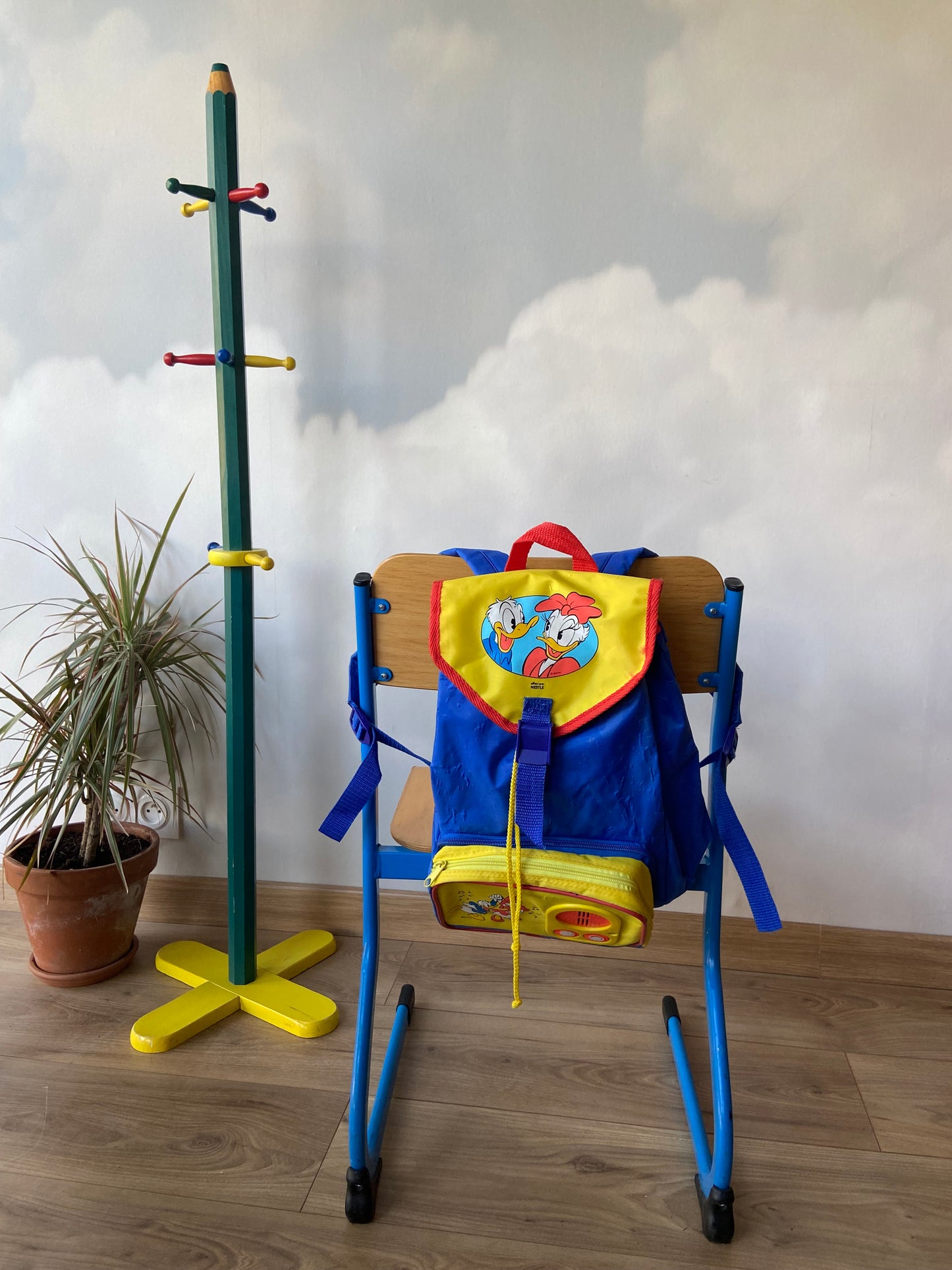 Wooden school chair with blue metal “sled” structure