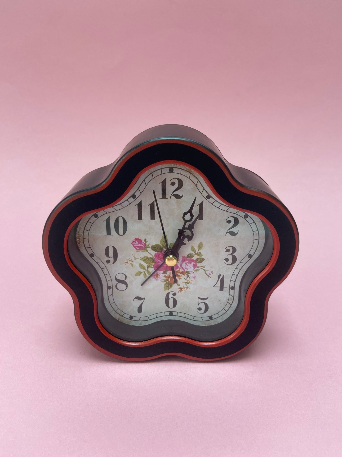 FLOWER-shaped plastic alarm clock