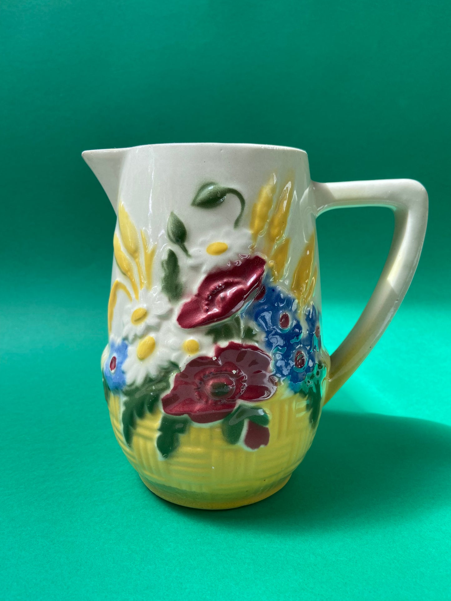 Saint Clément barbotine pitcher with wildflower decor