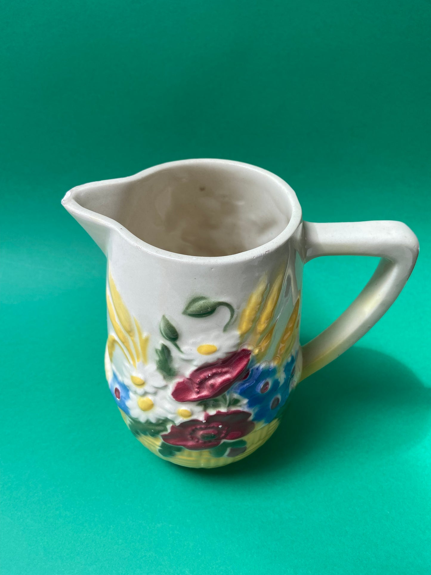 Saint Clément barbotine pitcher with wildflower decor