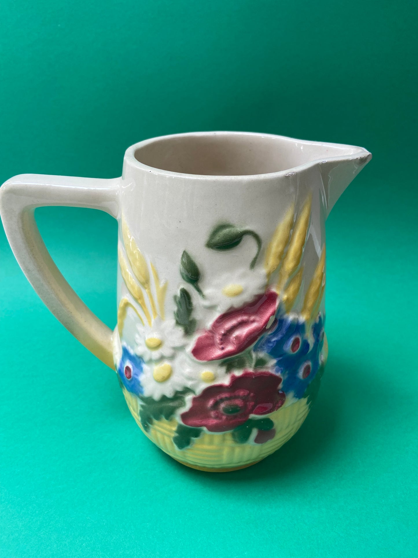 Saint Clément barbotine pitcher with wildflower decor