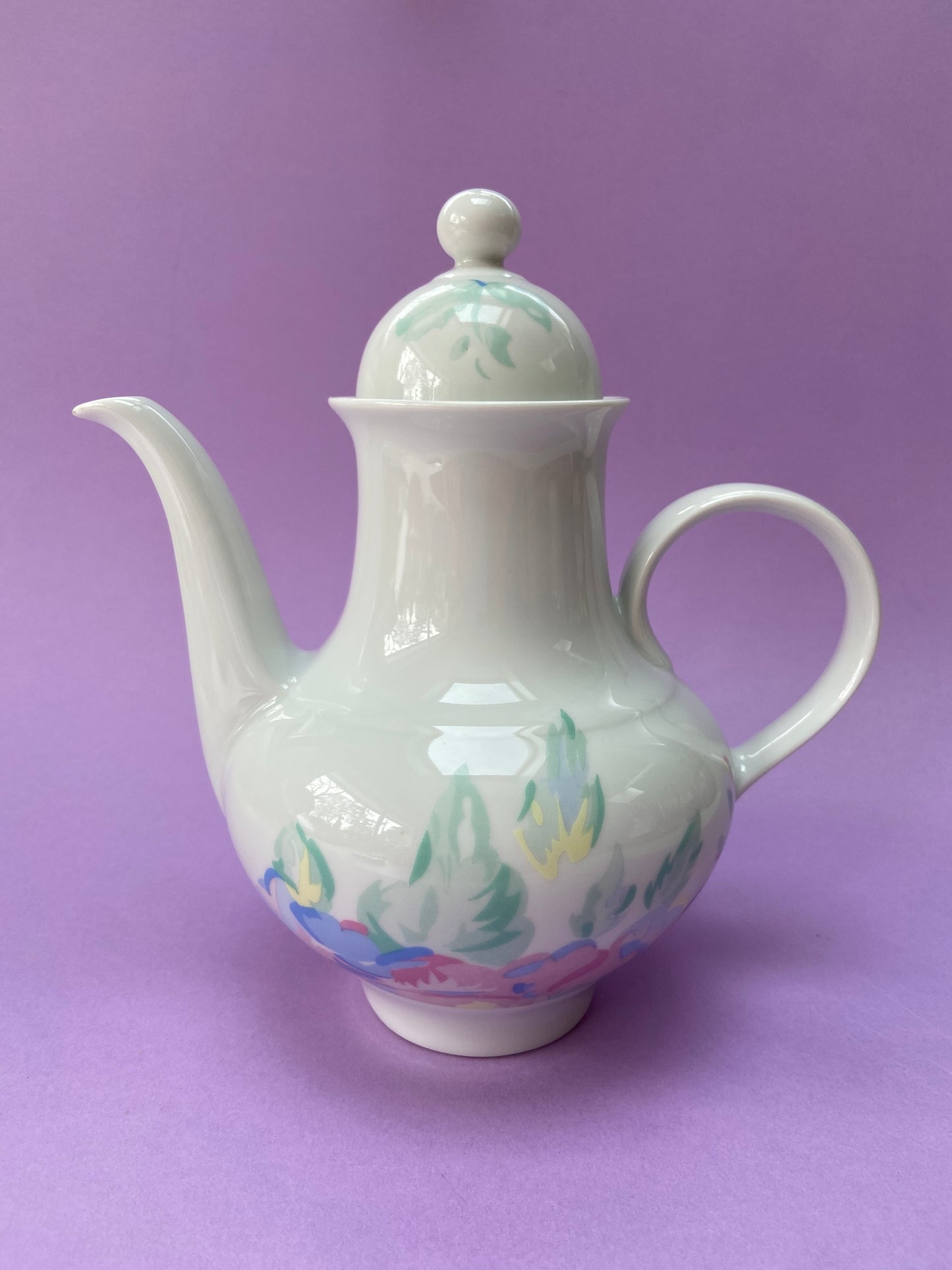 Antique German porcelain teapot with pastel floral decoration