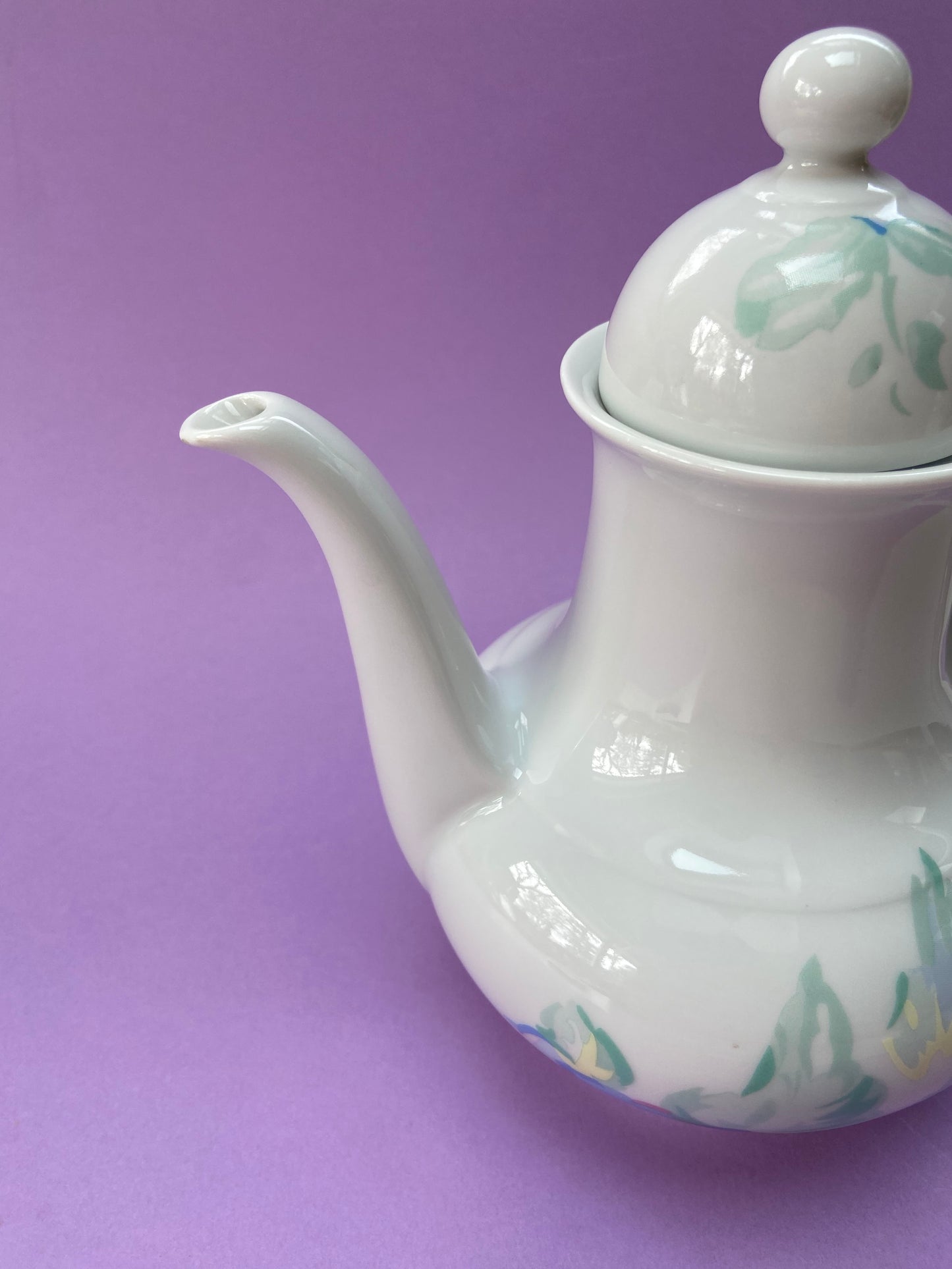 Antique German porcelain teapot with pastel floral decoration