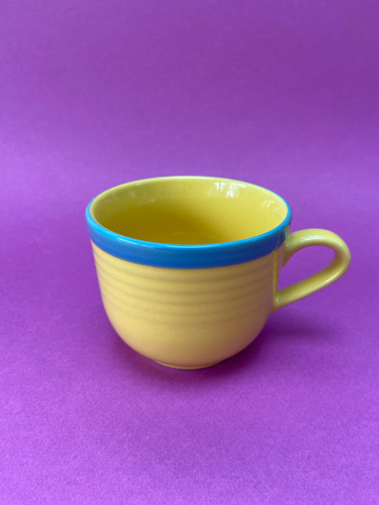 Yellow cup with blue border