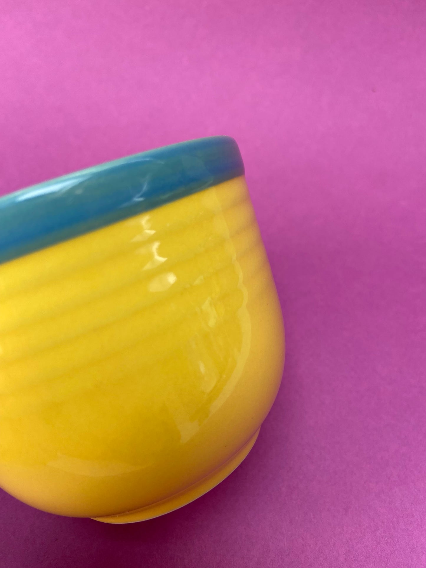 Yellow cup with blue border