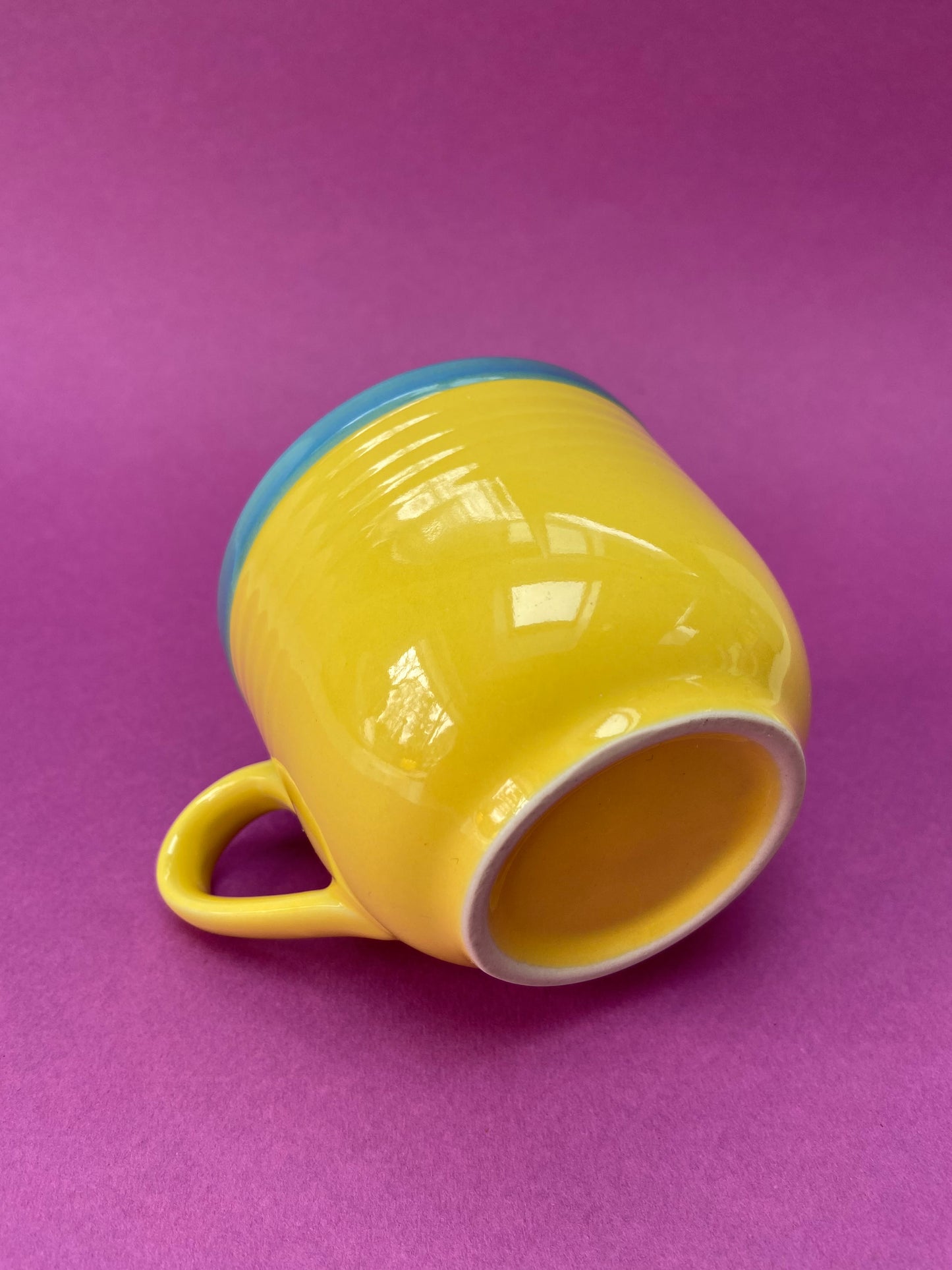 Yellow cup with blue border