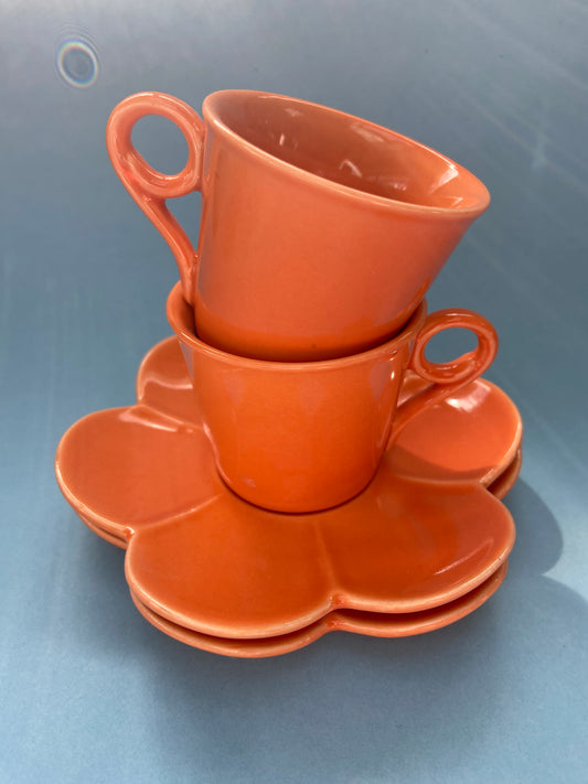 Duo of apricot-colored espresso cups with Fleur saucer