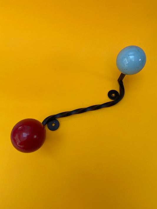 Wrought iron coat rack with RED and BLUE colored balls