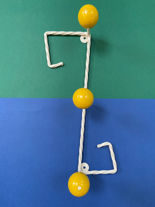 Wrought iron coat rack with 4 YELLOW colored balls