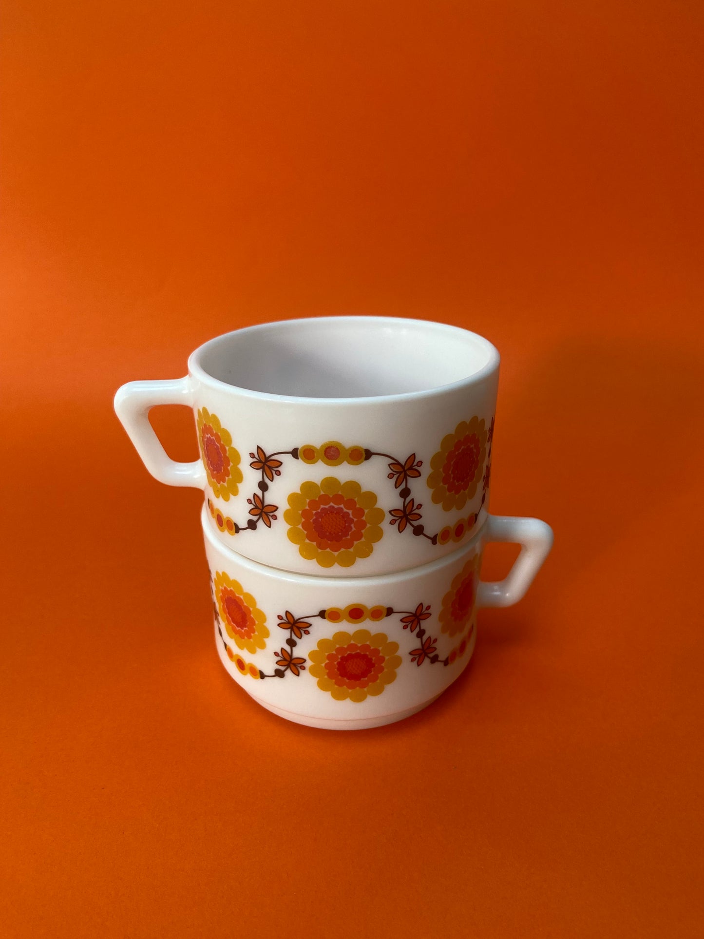 2 small Arcopal cups with ORANGE floral pattern