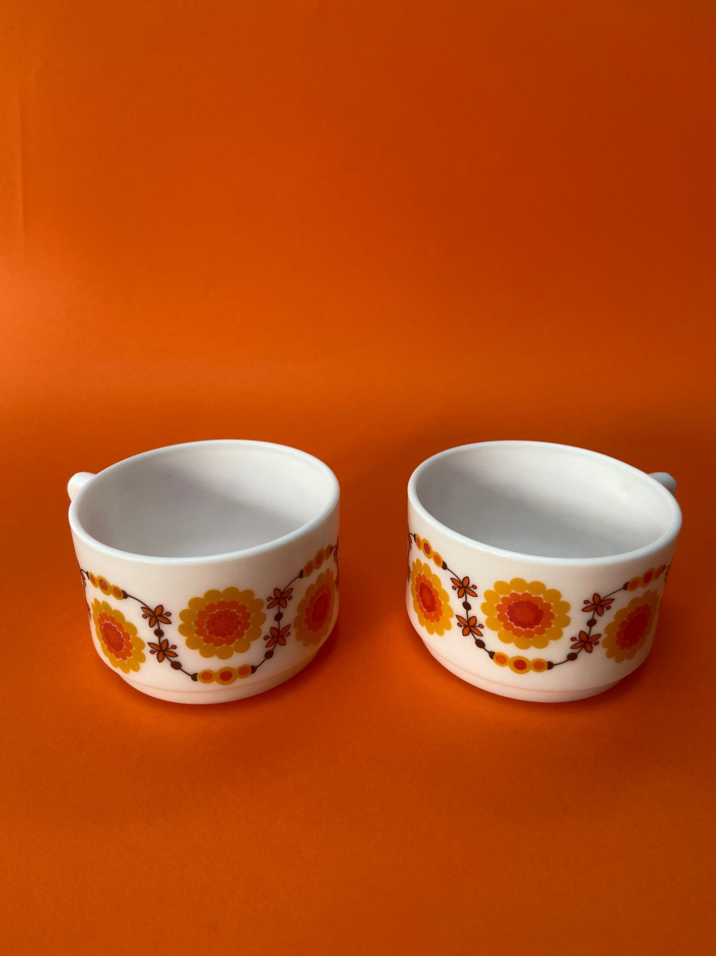 2 small Arcopal cups with ORANGE floral pattern