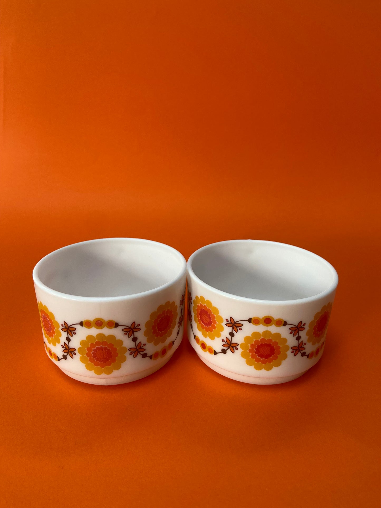 2 small Arcopal cups with ORANGE floral pattern