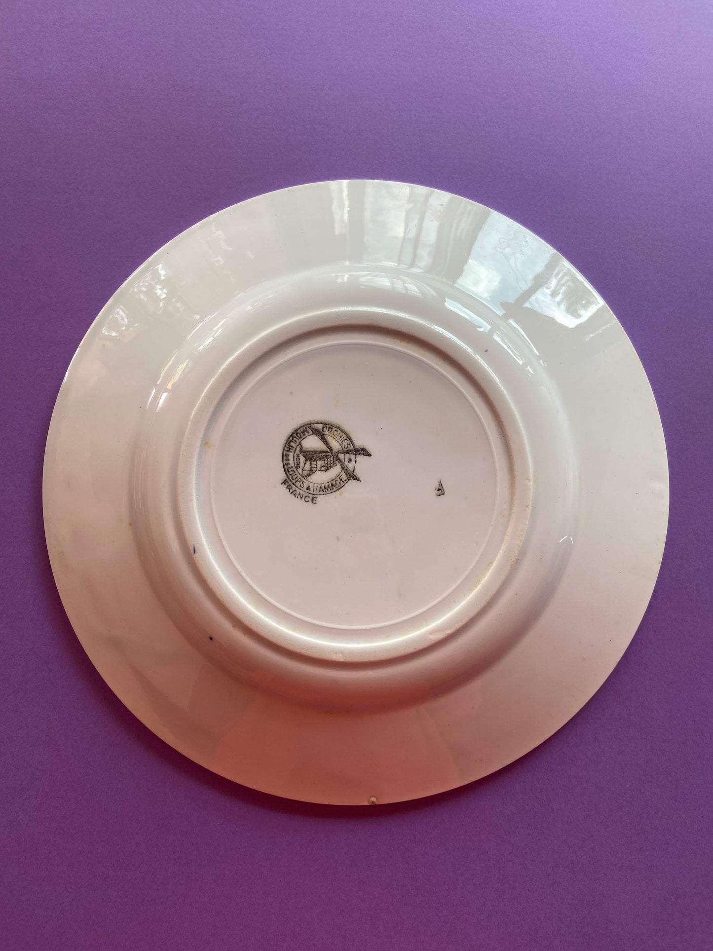 MOULIN DES LOUPS deep plate with purple geometric pattern