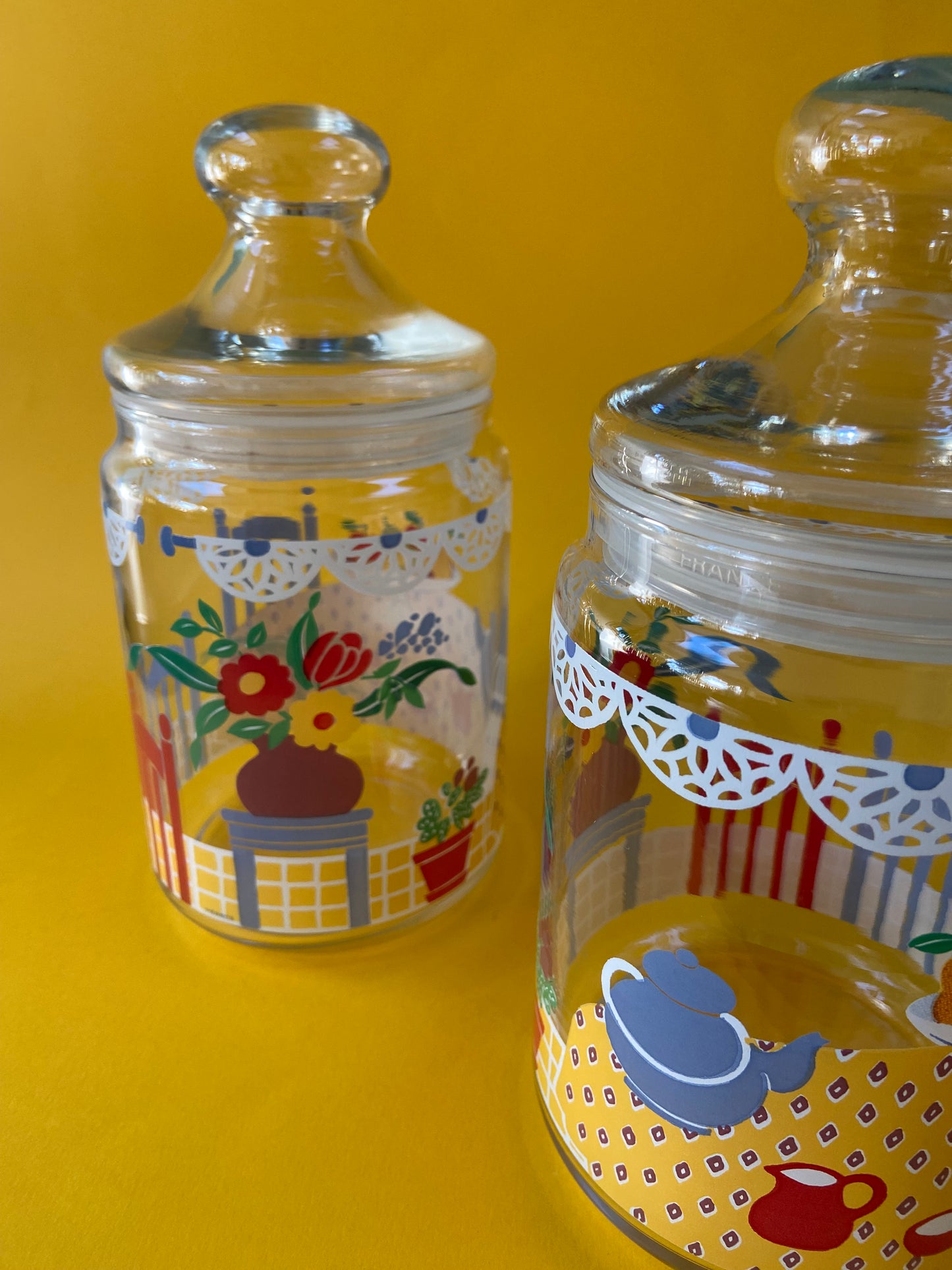 Vintage glass storage jar with CUISINE motif