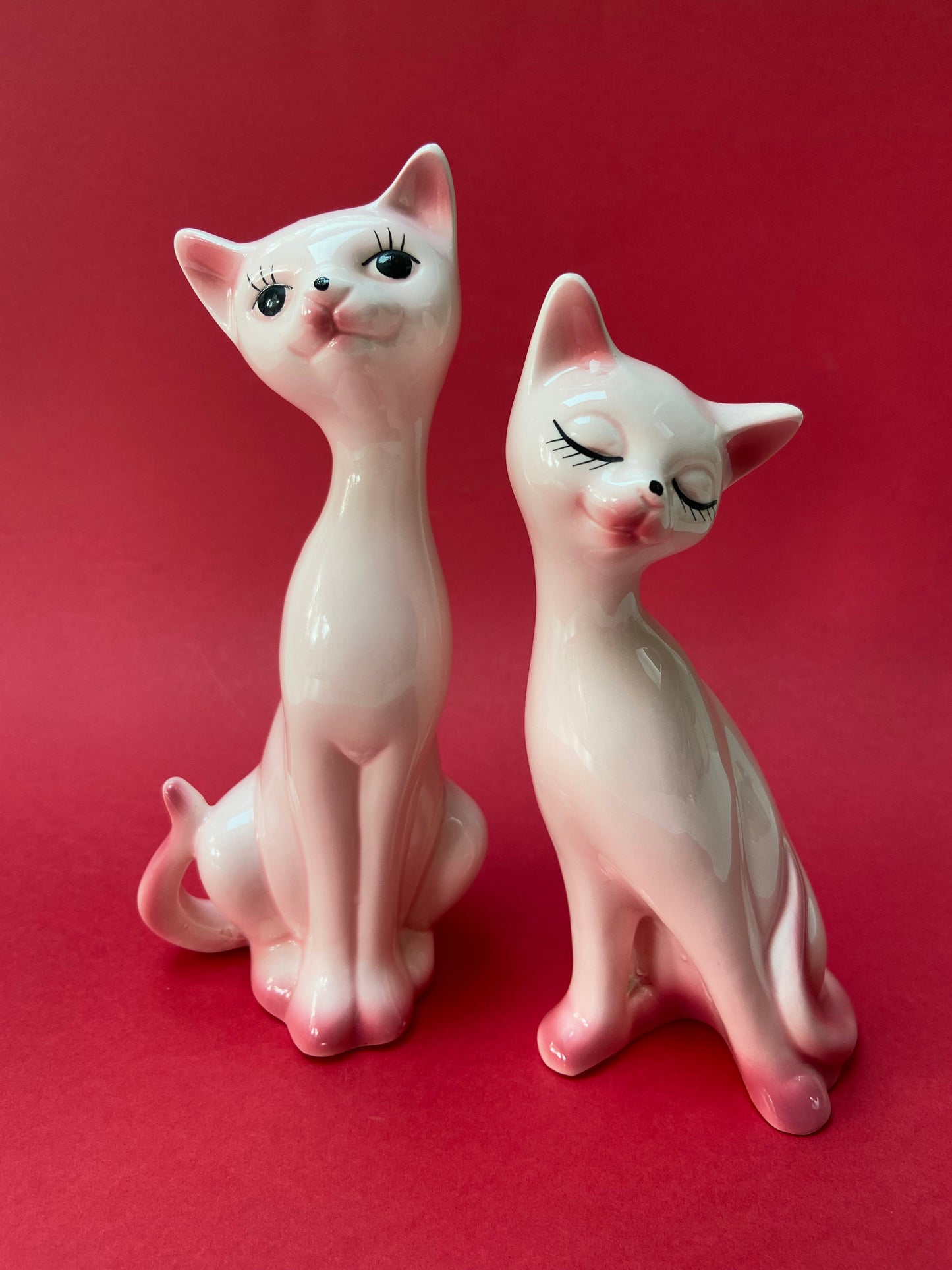 Couple of cute pink ceramic cats