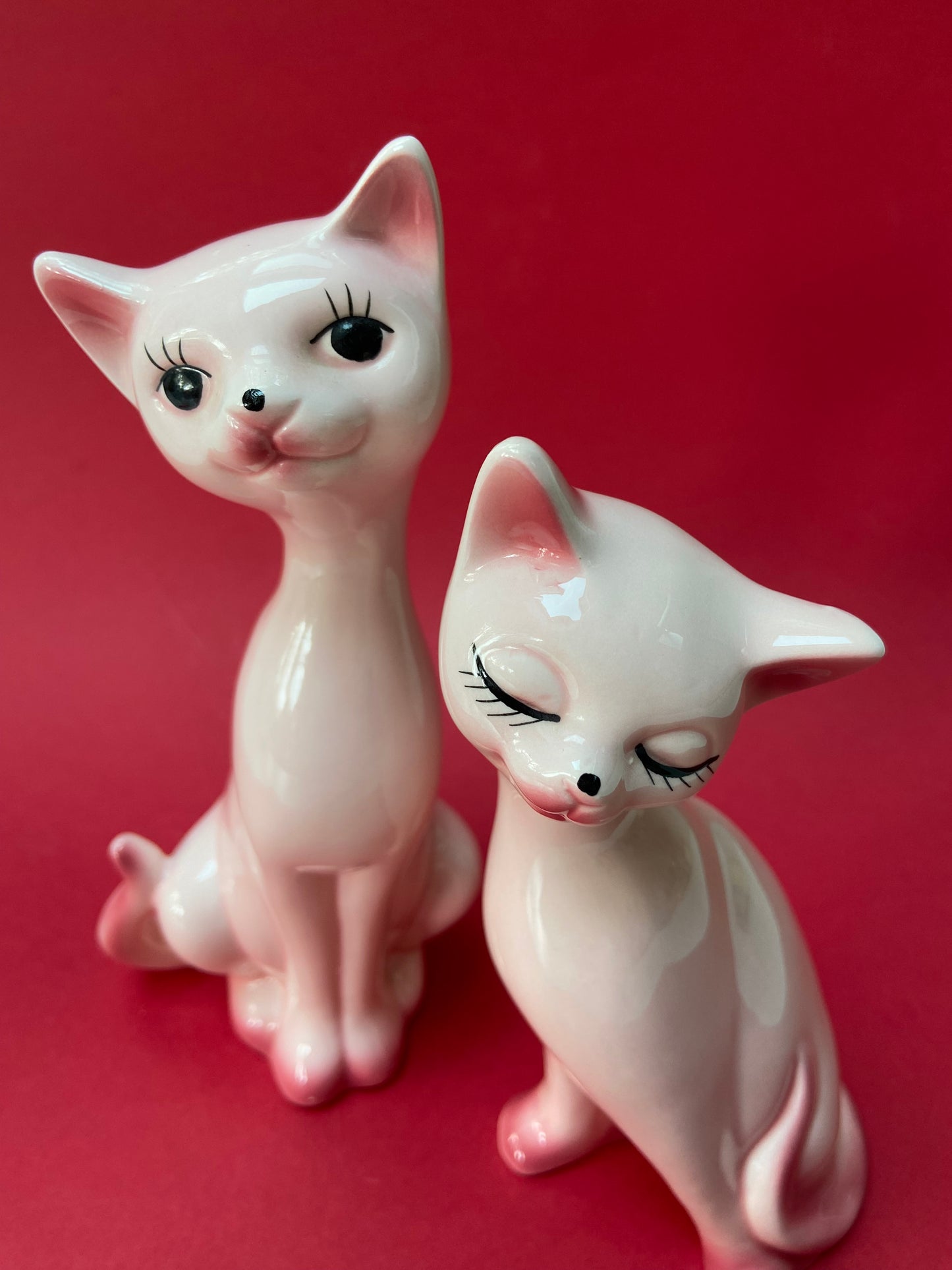 Couple of cute pink ceramic cats