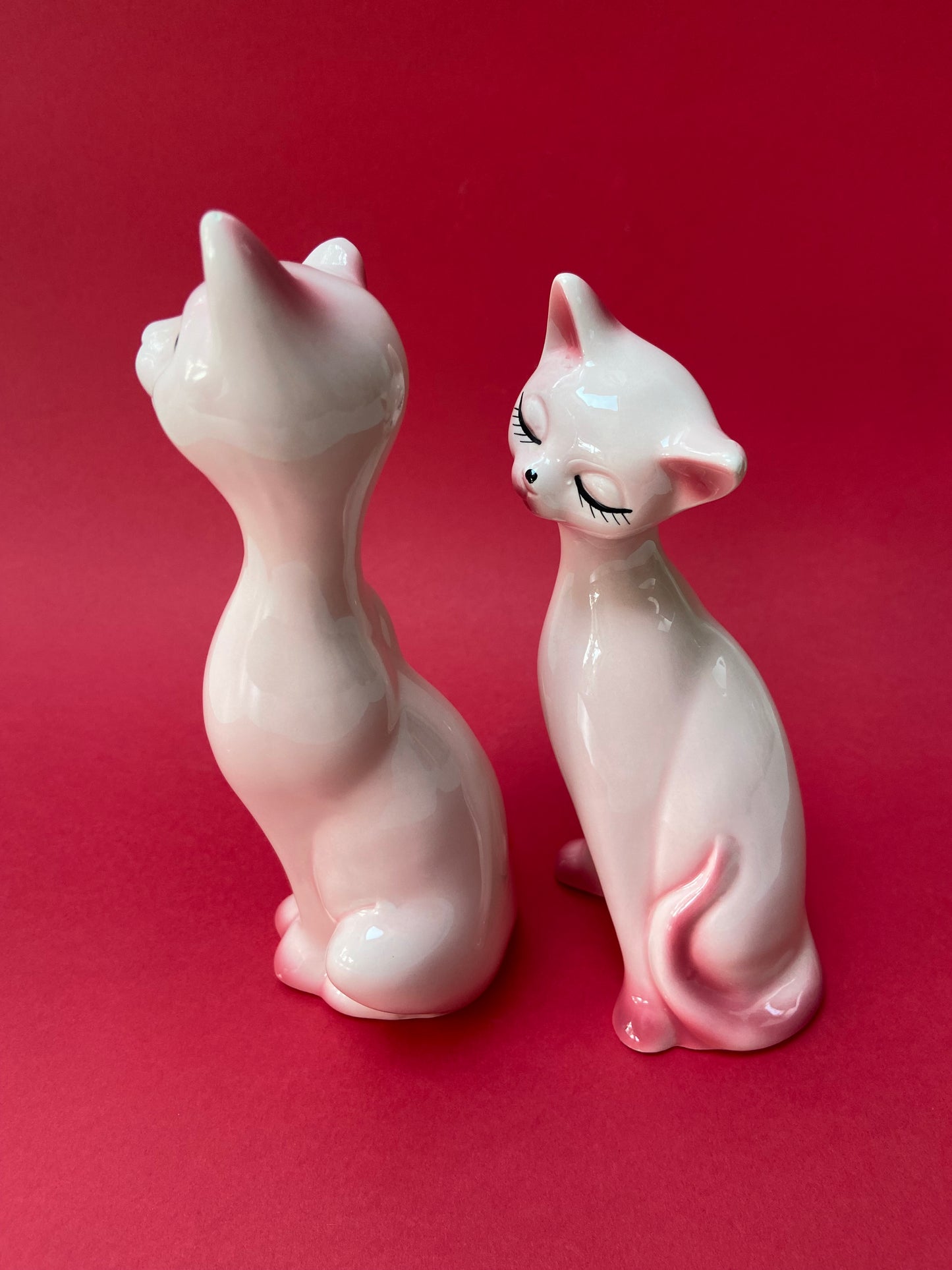 Couple of cute pink ceramic cats