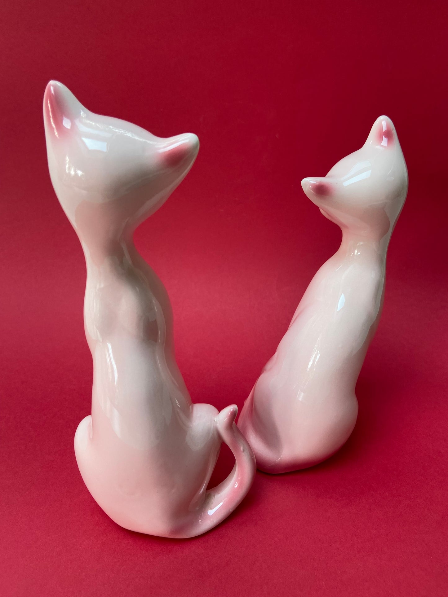 Couple of cute pink ceramic cats