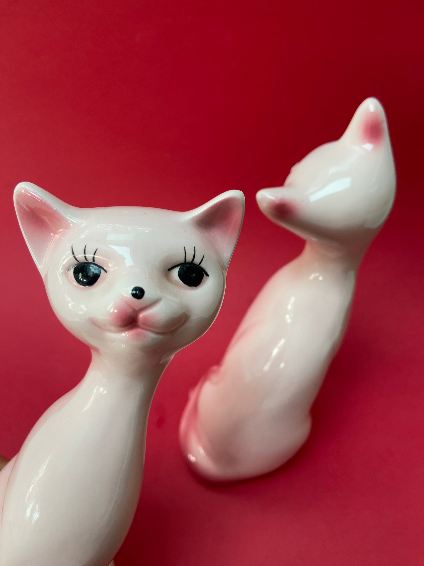 Couple of cute pink ceramic cats