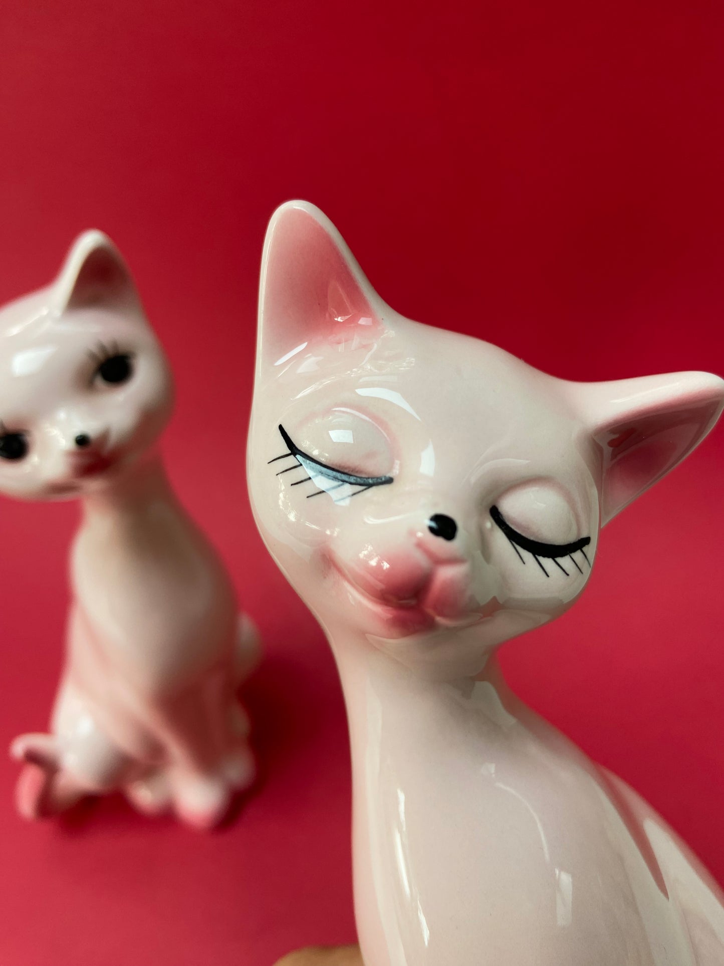 Couple of cute pink ceramic cats