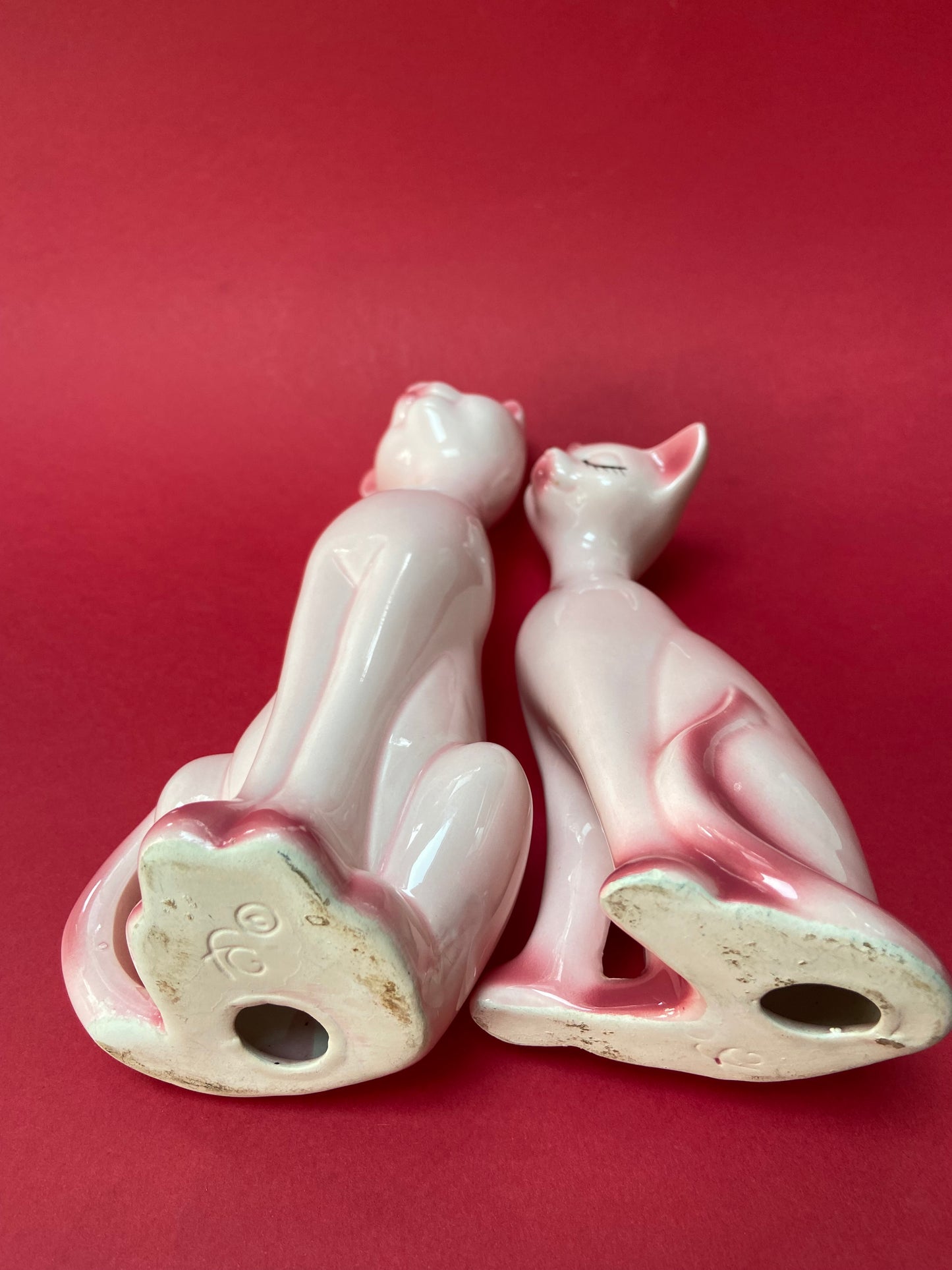 Couple of cute pink ceramic cats