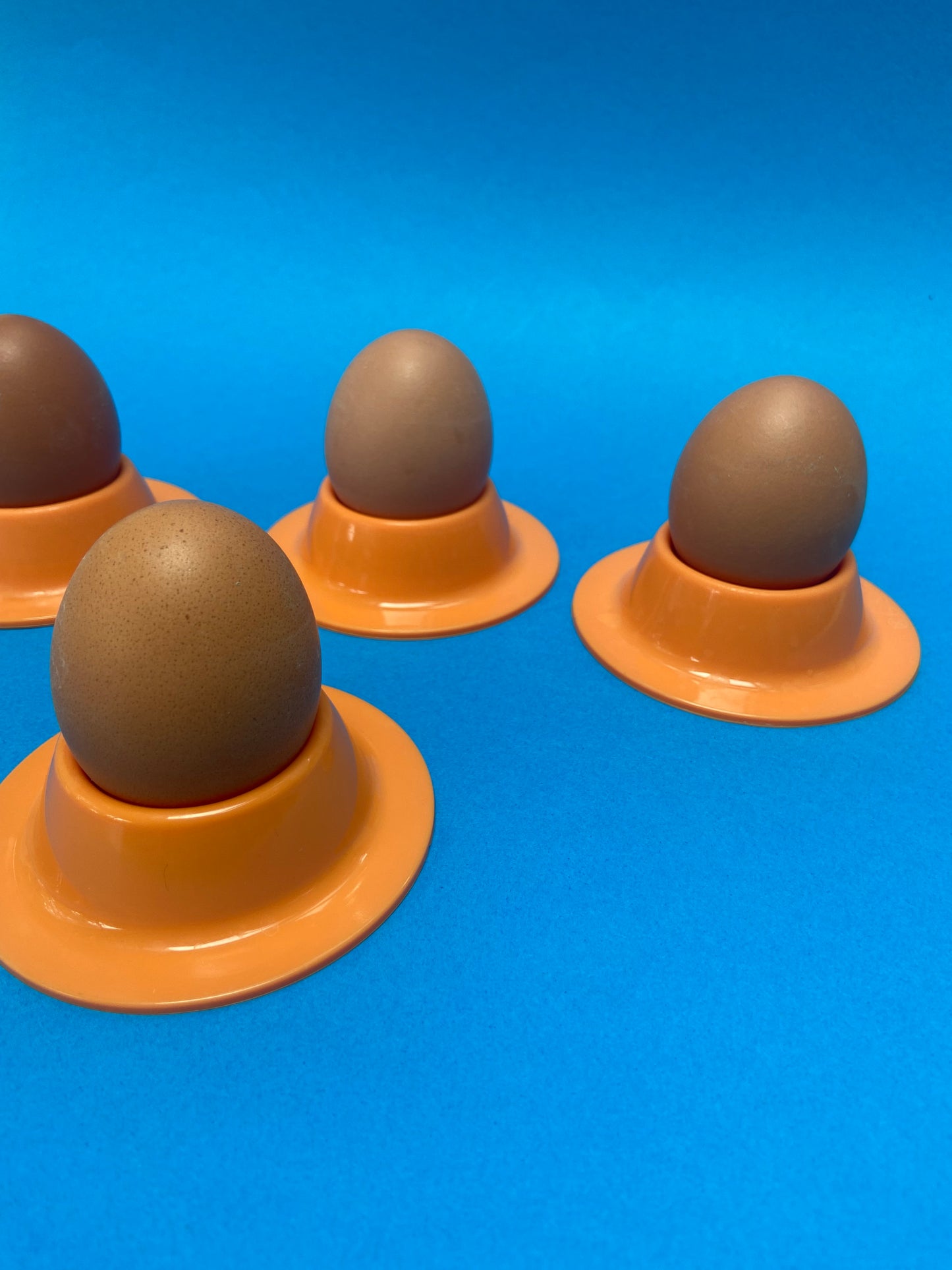 Set of 4 ORANGE plastic egg cups