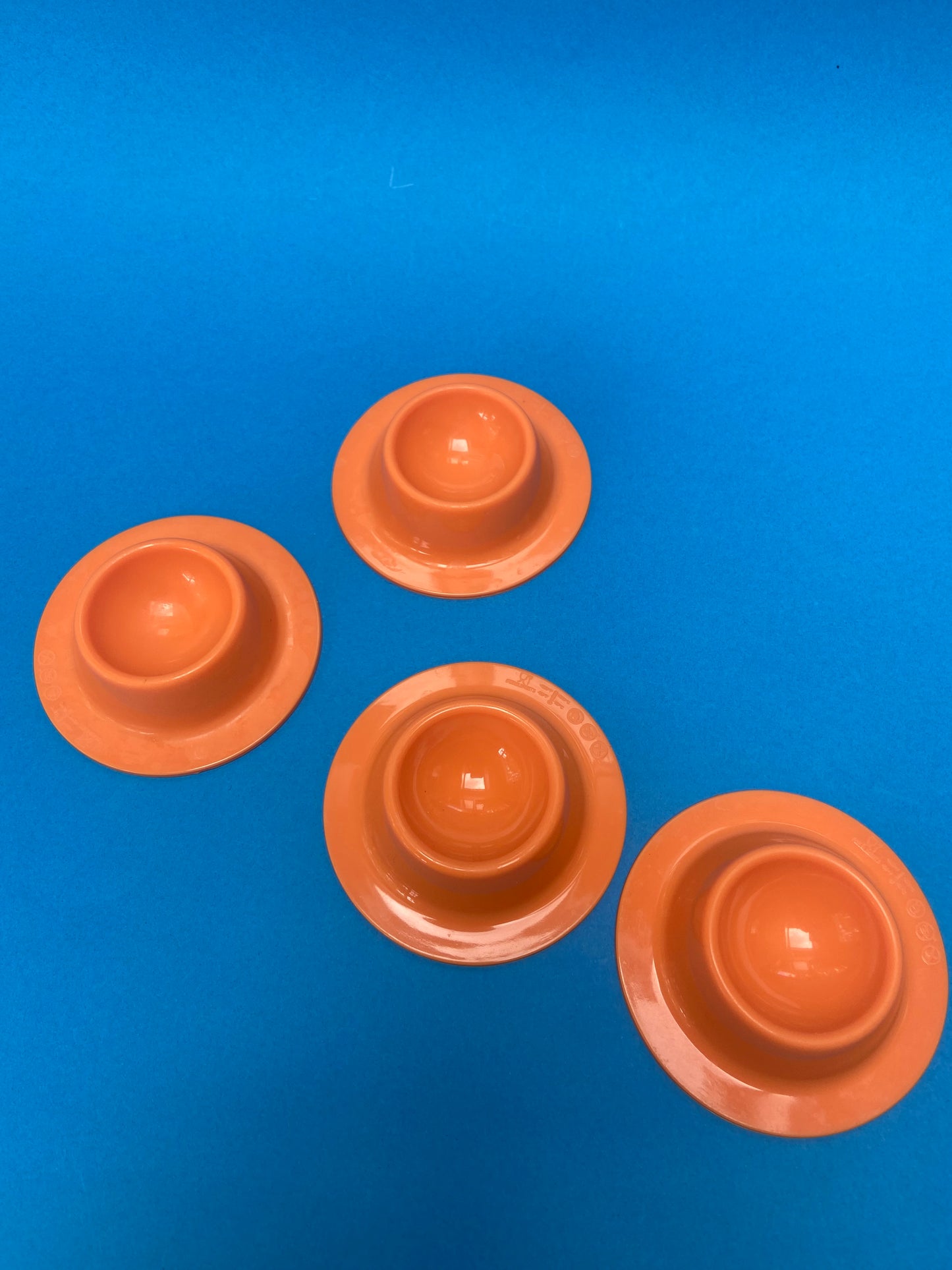 Set of 4 ORANGE plastic egg cups