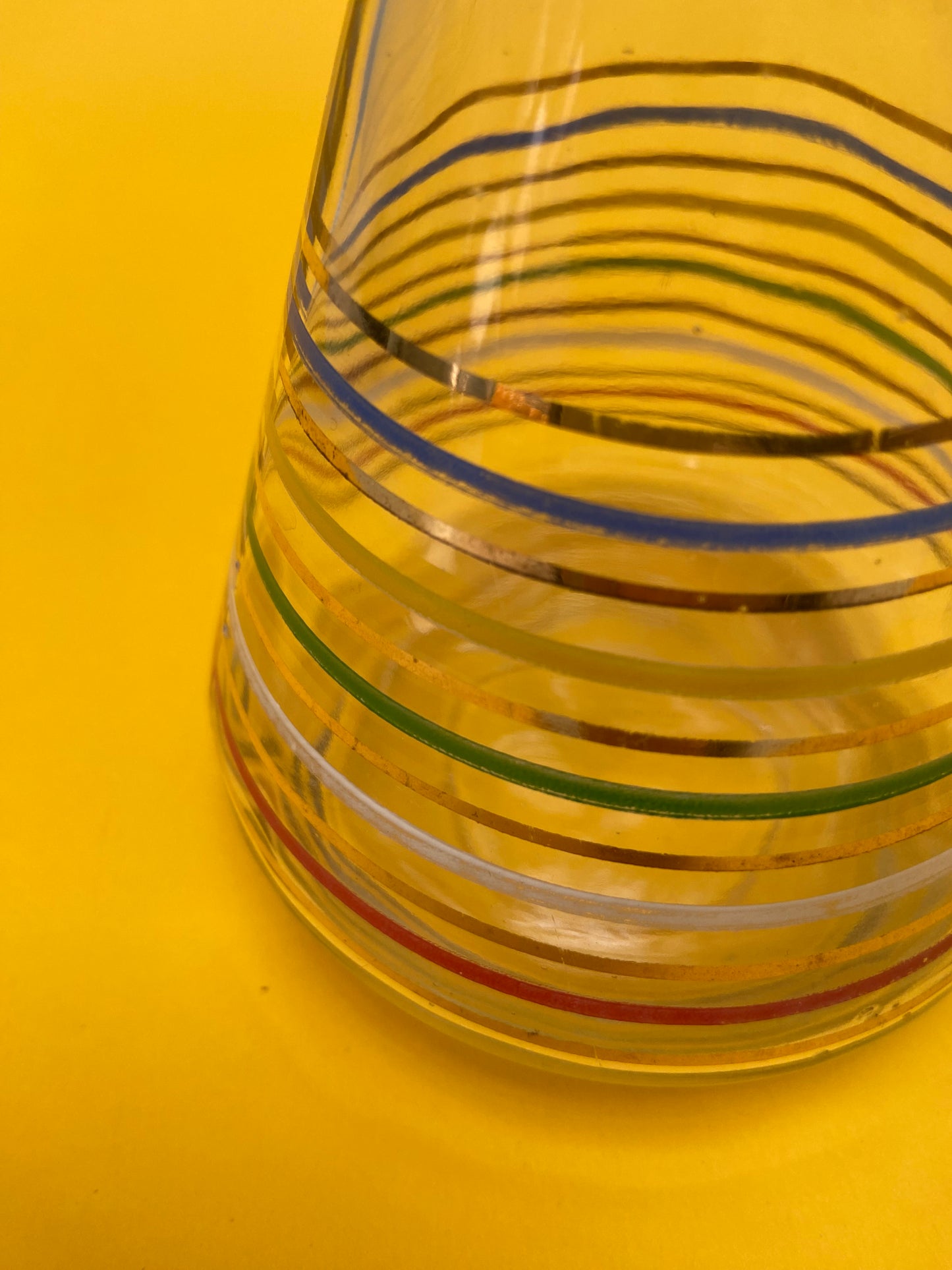 Glass carafe with colored lines