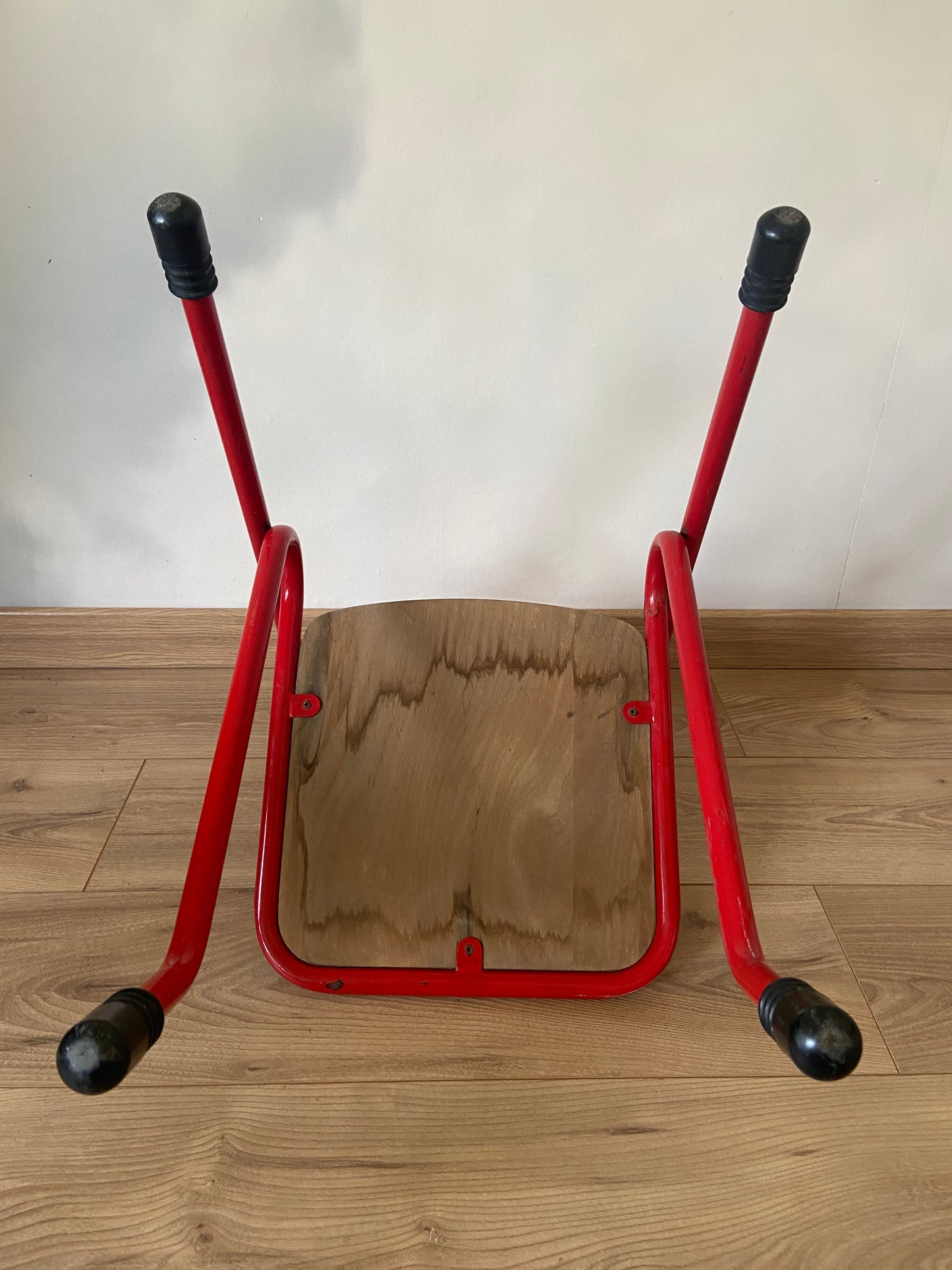 Vintage school chair with grid decor and colored metal structure