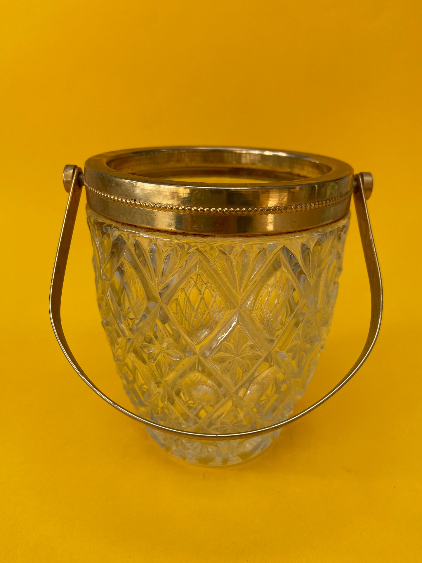 Vintage ice bucket with iridescent glass and gold metal handle