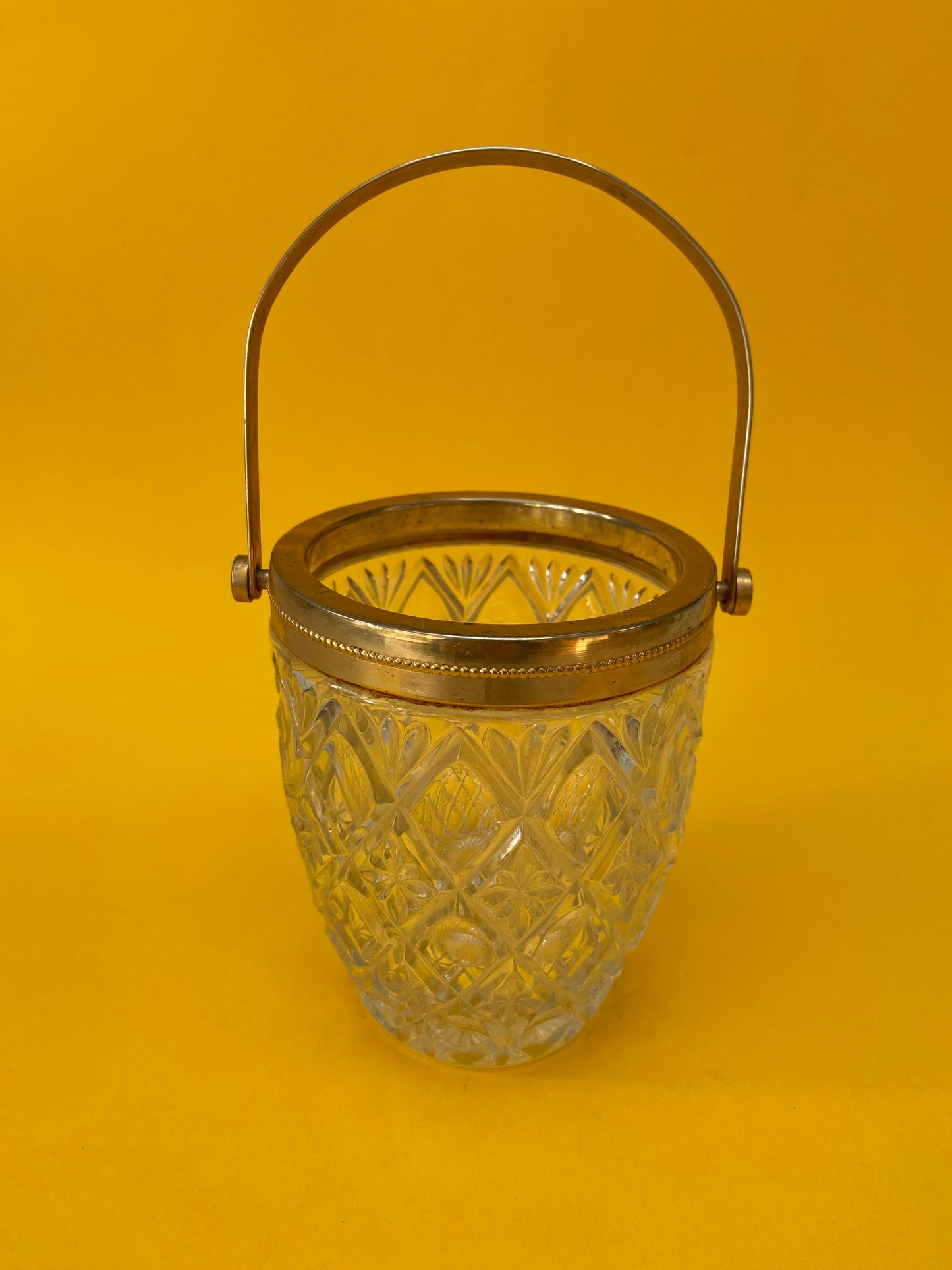 Vintage ice bucket with iridescent glass and gold metal handle