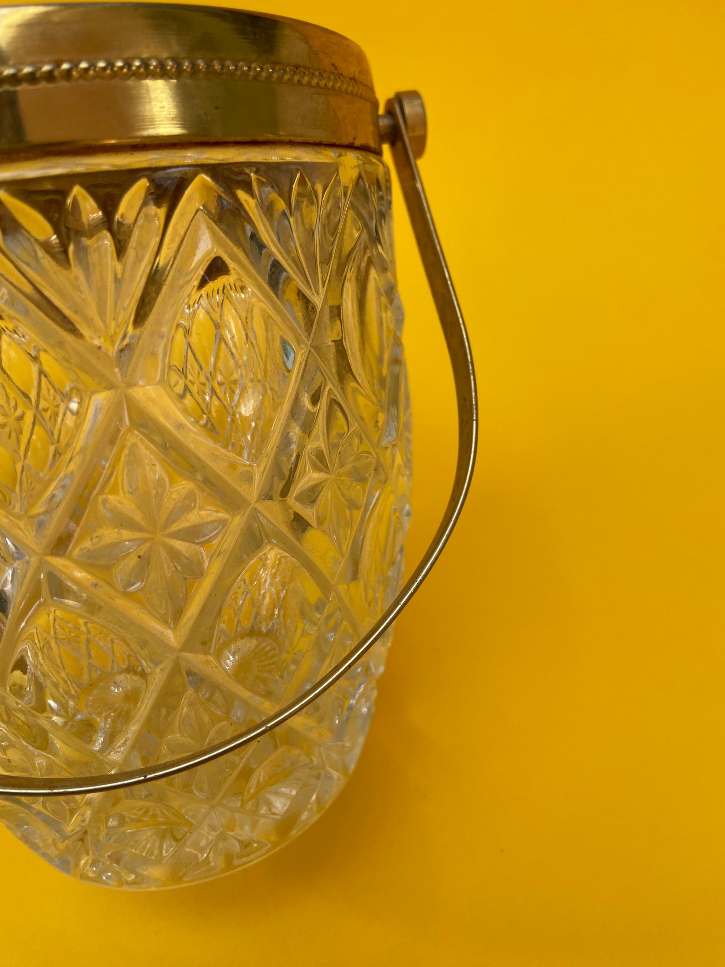 Vintage ice bucket with iridescent glass and gold metal handle